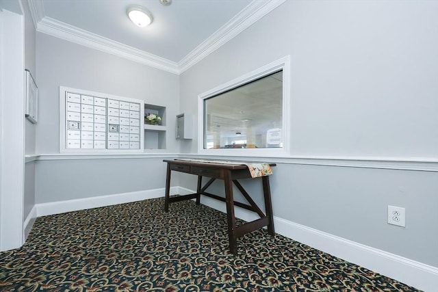 carpeted office space with a mail area and crown molding