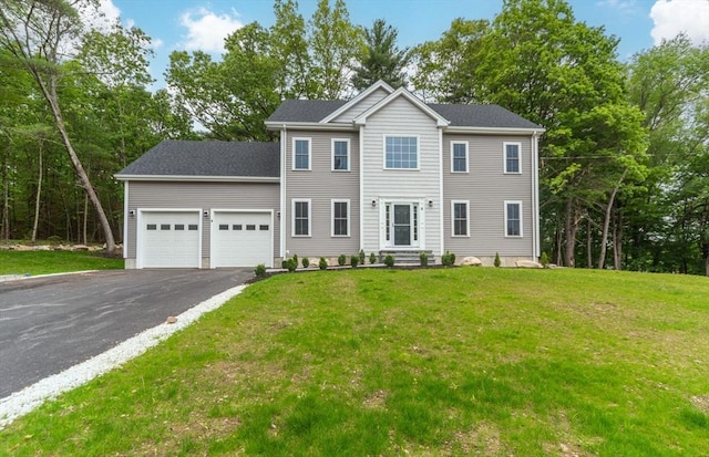 LOT0 Pine Hill Rd, Oxford, MA 01537 - colonial house with asphalt driveway, a garage, and a front lawn