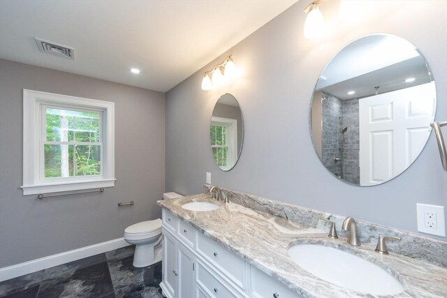 LOT0 Pine Hill Rd, Oxford, MA 01537 - bathroom with baseboards, double vanity, toilet, tiled shower, and recessed lighting