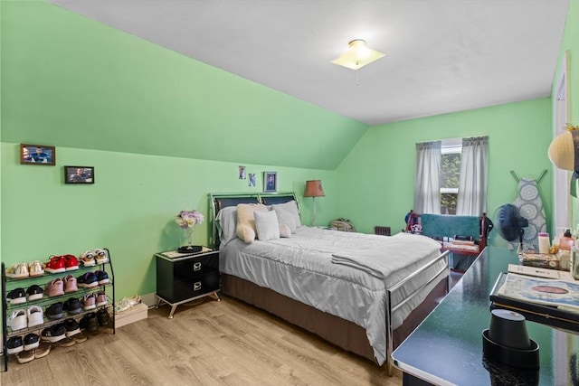 209 Grove St, Brockton, MA 02302 - bedroom with vaulted ceiling and light wood-type flooring