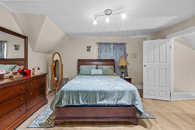 209 Grove St, Brockton, MA 02302 - bedroom with light wood-style floors, lofted ceiling, and baseboards