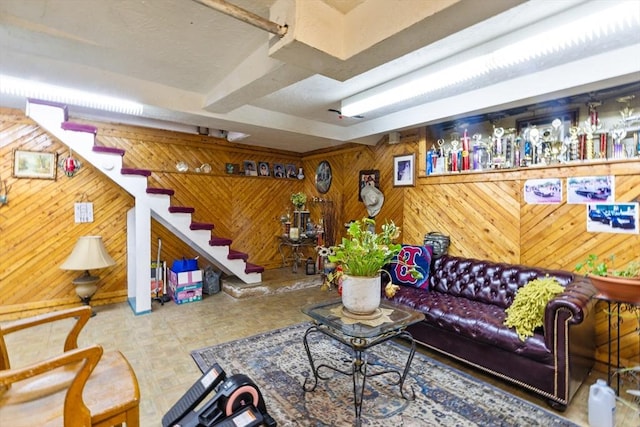209 Grove St, Brockton, MA 02302 - living room featuring wooden walls and stairway