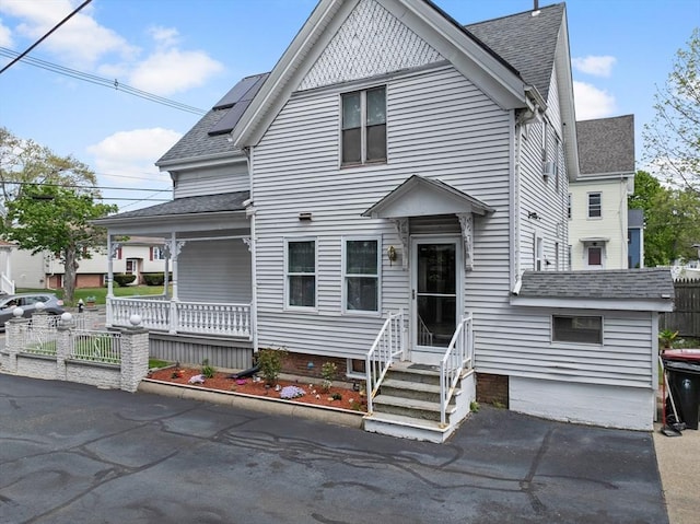 209 Grove St, Brockton, MA 02302 - victorian-style house featuring roof with shingles and covered porch