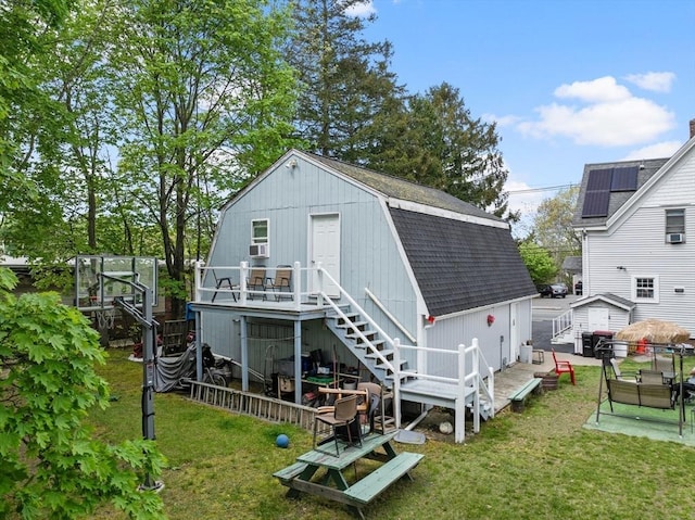 209 Grove St, Brockton, MA 02302 - rear view of house featuring a gambrel roof, a shingled roof, stairs, and a deck