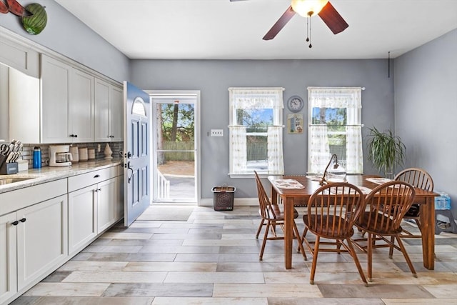 209 Grove St, Brockton, MA 02302 - dining space featuring ceiling fan and light wood-style flooring