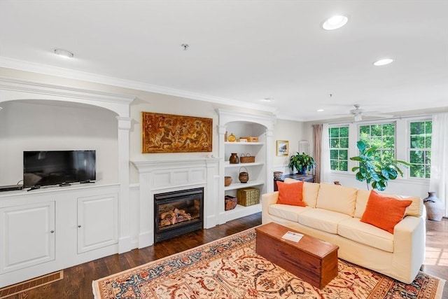 4 Derby Unit B, Salisbury, MA 01952 - living room with a ceiling fan, crown molding, wood finished floors, a glass covered fireplace, and recessed lighting