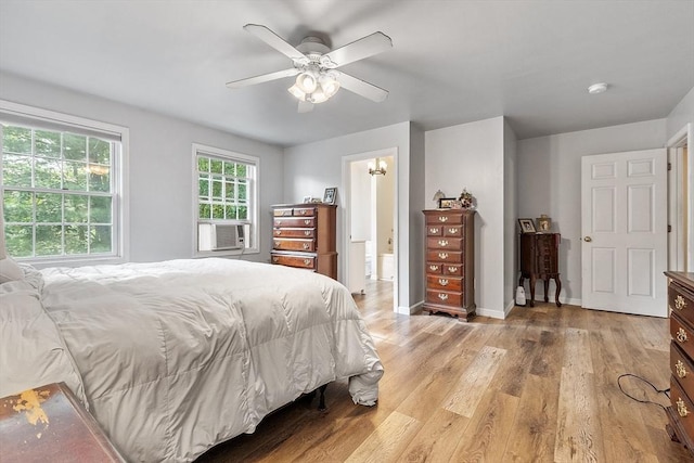 935 Old Keene Rd, Athol, MA 01331 - bedroom with cooling unit, light wood-style floors, a ceiling fan, and connected bathroom