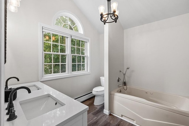 935 Old Keene Rd, Athol, MA 01331 - bathroom featuring a baseboard radiator, lofted ceiling, double vanity, wood finished floors, and a chandelier