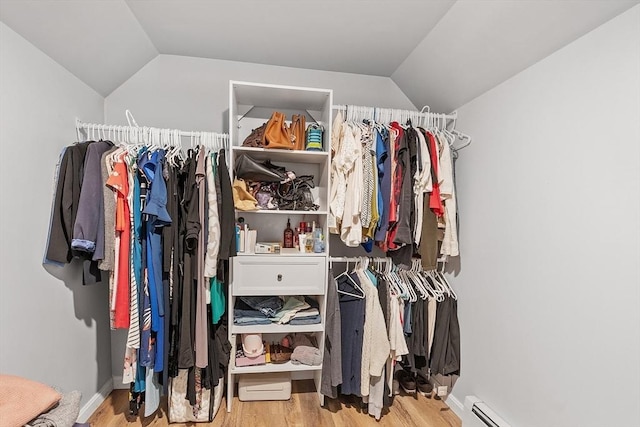 935 Old Keene Rd, Athol, MA 01331 - walk in closet with lofted ceiling, wood finished floors, and baseboard heating