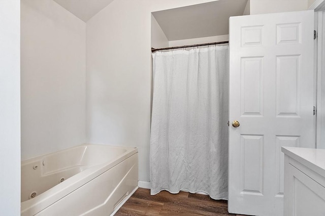 935 Old Keene Rd, Athol, MA 01331 - full bathroom with wood finished floors, a whirlpool tub, vanity, and a shower with curtain