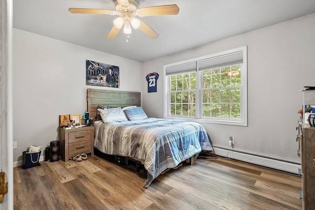 935 Old Keene Rd, Athol, MA 01331 - bedroom with a baseboard radiator, wood finished floors, and a ceiling fan