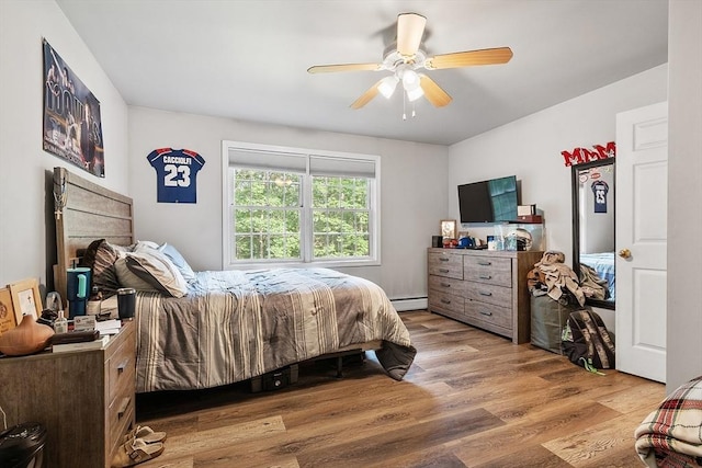 935 Old Keene Rd, Athol, MA 01331 - bedroom featuring wood finished floors, baseboard heating, and a ceiling fan