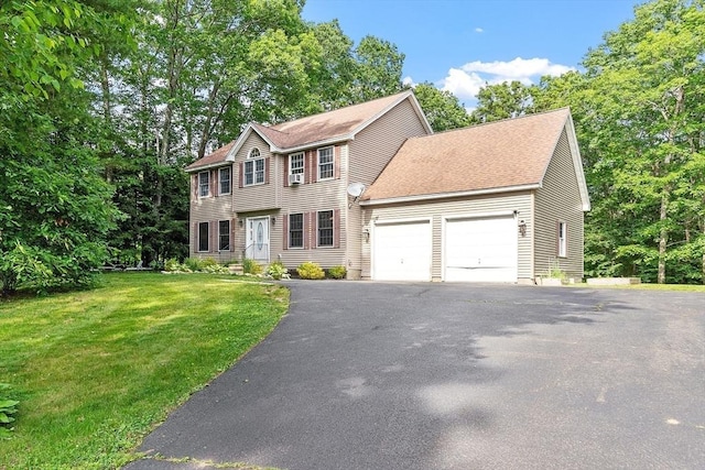 935 Old Keene Rd, Athol, MA 01331 - colonial home featuring an attached garage, driveway, a front yard, and roof with shingles
