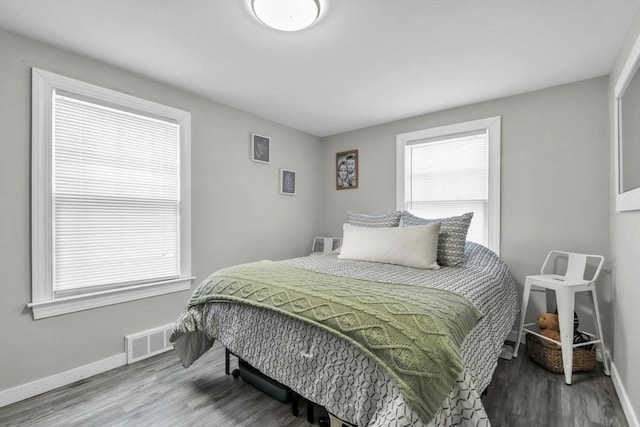 bedroom featuring hardwood / wood-style flooring