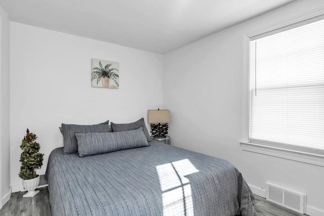 bedroom featuring wood-type flooring