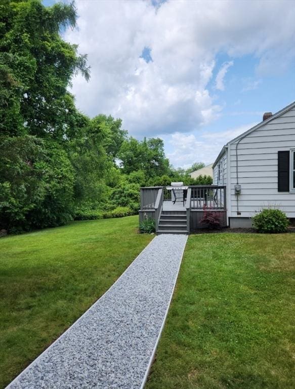 view of yard with a deck