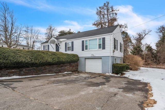 exterior space featuring a garage