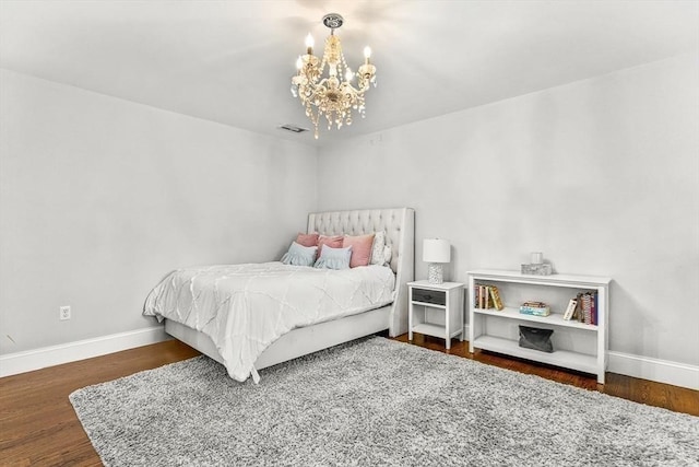 4 Fairfield Pl, Winchester, MA 01890 - bedroom with baseboards, a chandelier, and wood finished floors