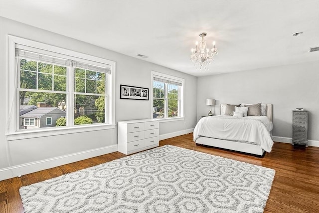 4 Fairfield Pl, Winchester, MA 01890 - bedroom featuring a chandelier, baseboards, and dark wood finished floors