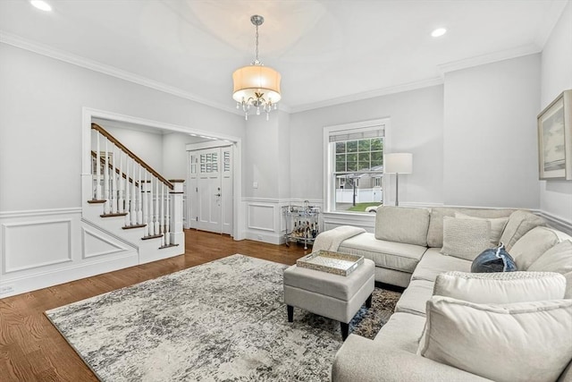 4 Fairfield Pl, Winchester, MA 01890 - living area with stairway, a chandelier, wood finished floors, recessed lighting, and a wainscoted wall