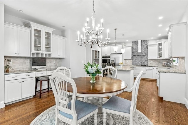 4 Fairfield Pl, Winchester, MA 01890 - dining area featuring dark wood-style floors, recessed lighting, and a chandelier