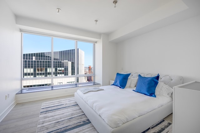 bedroom featuring light hardwood / wood-style floors