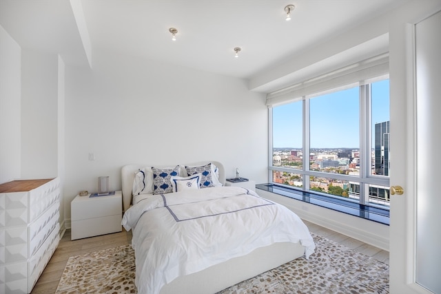 bedroom featuring light wood-type flooring