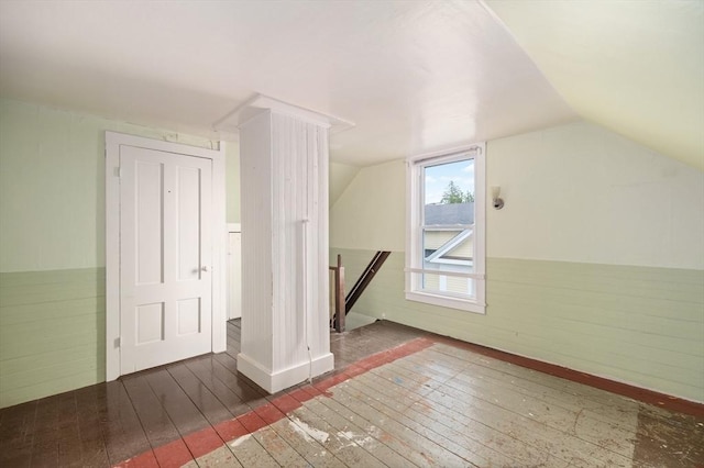 300-302 Main St, Gloucester, MA 01930 - bonus room with hardwood / wood-style floors, vaulted ceiling, and a wainscoted wall