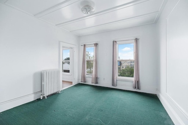 300-302 Main St, Gloucester, MA 01930 - empty room featuring radiator and carpet floors