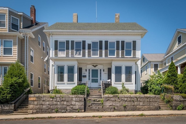 300-302 Main St, Gloucester, MA 01930 - view of front of property featuring stairs, covered porch, and a chimney