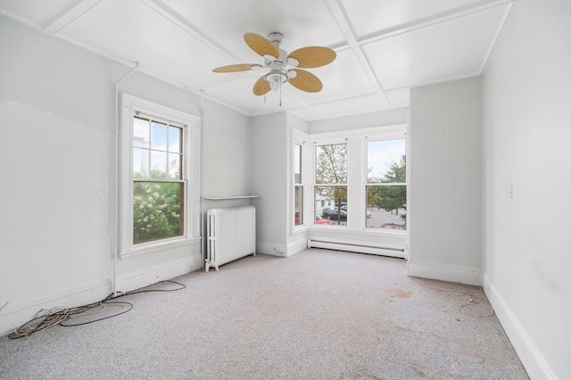 300-302 Main St, Gloucester, MA 01930 - spare room with radiator, carpet floors, baseboard heating, a ceiling fan, and coffered ceiling