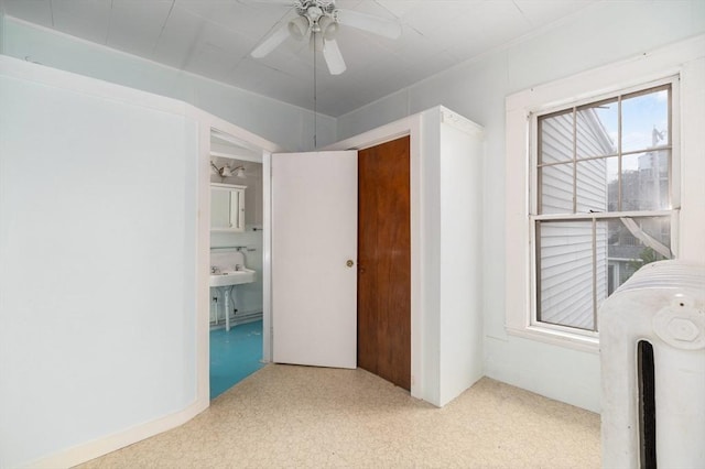 300-302 Main St, Gloucester, MA 01930 - unfurnished bedroom with carpet floors and ceiling fan