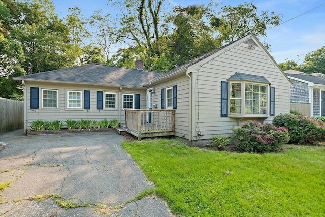 32 Standish Ave, Plymouth, MA 02360 - ranch-style house with a chimney and a wooden deck