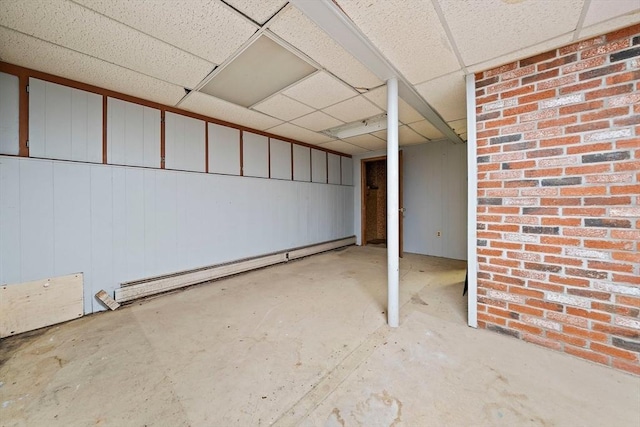 32 Standish Ave, Plymouth, MA 02360 - finished basement with a baseboard heating unit and a paneled ceiling
