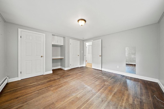 32 Standish Ave, Plymouth, MA 02360 - unfurnished bedroom with wood finished floors and baseboard heating