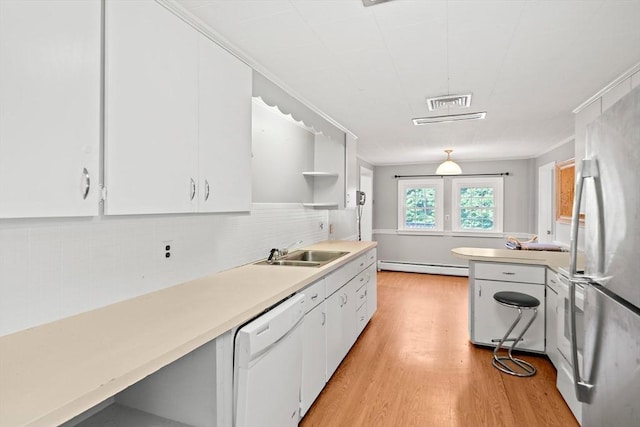 32 Standish Ave, Plymouth, MA 02360 - kitchen with freestanding refrigerator, white dishwasher, baseboard heating, light wood-style flooring, and white cabinets