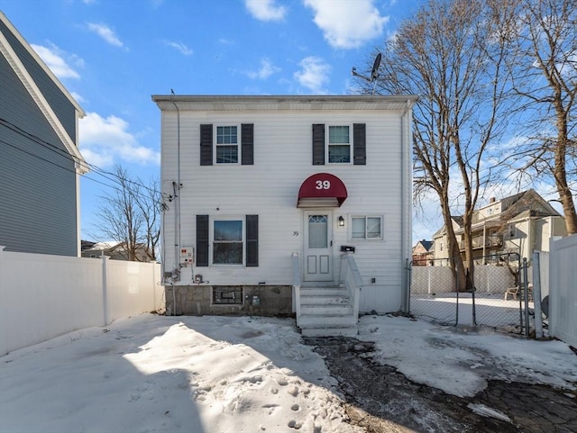 view of front of house with fence