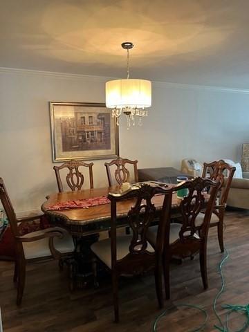 255 N Rd Unit 137, Chelmsford, MA 01824 - dining room with ornamental molding, a notable chandelier, and wood finished floors