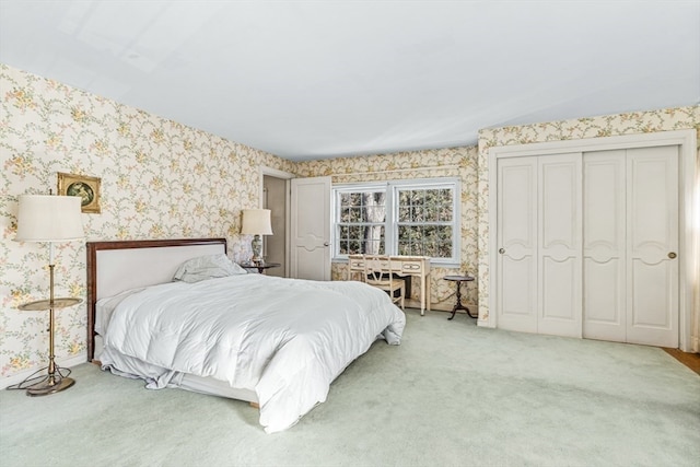 bedroom with carpet floors and a closet