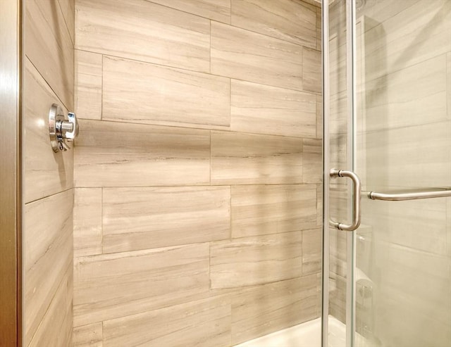 bathroom featuring a stall shower