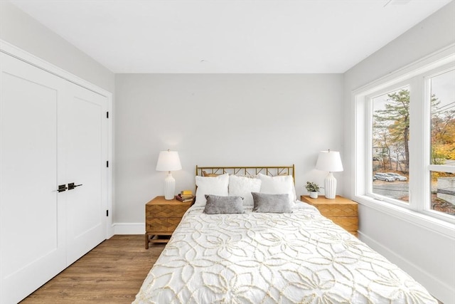 bedroom with light wood-type flooring