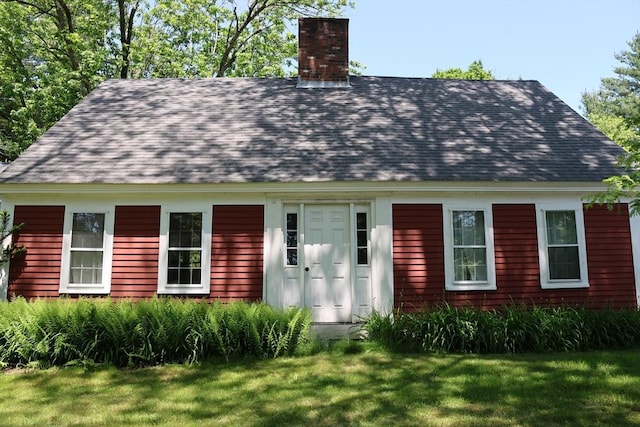 294 Silver St, Hanover, MA 02339 - new england style home featuring a chimney, a front yard, and roof with shingles