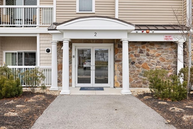 entrance to property with french doors