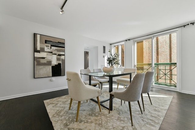 dining space featuring hardwood / wood-style flooring