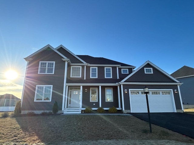 view of front of property featuring a garage