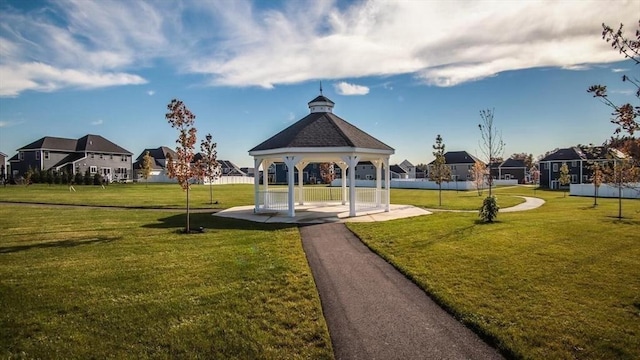 view of community with a gazebo and a lawn