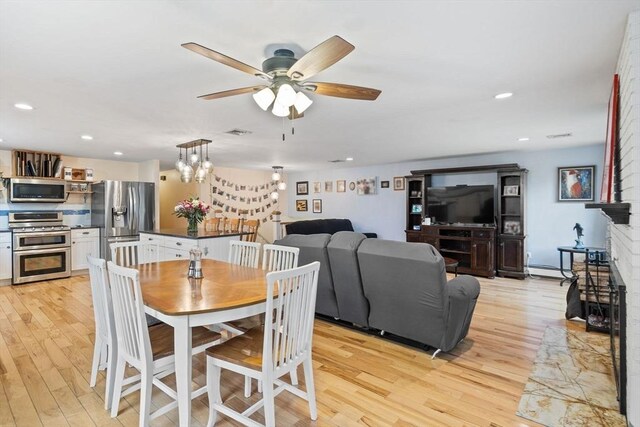 11 Michael Rd, Bourne, MA 02559 - dining room featuring recessed lighting, visible vents, light wood-style flooring, baseboard heating, and ceiling fan