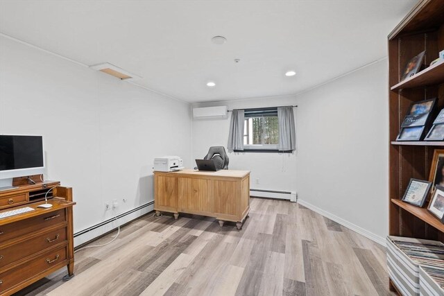 11 Michael Rd, Bourne, MA 02559 - office area featuring a baseboard heating unit, attic access, a wall mounted AC, and light wood-style floors