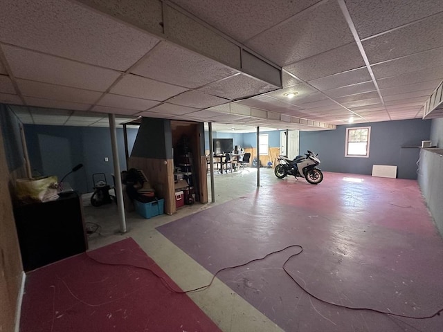 below grade area featuring a paneled ceiling