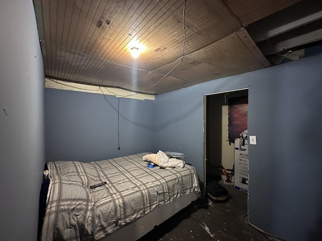 bedroom with concrete flooring